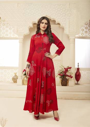 Add This Beautiful Readymade Gown To Your Wardrobe In Red Color. This Pretty Gown Is Fabricated On Rayon Beautified With Prints All Over. This Gown Is Soft Towards Skin Which Is Light Weight And Easy To Carry All Day Long. 