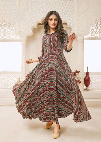 You Will Definitely Earn Lots Of Compliments Wearing This Readymade Gown In Multi Color. This Pretty Gown With Rich And Elegant Prints Is Fabricated on Rayon Which Is Soft Towards Skin and Easy To Carry All Day Long. 