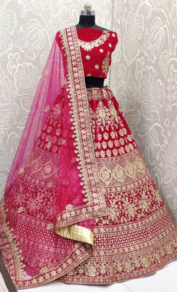 Look Pretty In This Every Girl's Favourite Color For Bridal Wear In All Over Rani Pink Colored Lehenga Choli. This Very Beautiful Heavy Designer Lehenga Choli Is Fabricated on Velvet Paired With Net Fabricated Dupatta. Buy Now. Its Attractive Embroidery And Color Will Definitlely Earn You Lots Of Compliments From Onlookers.