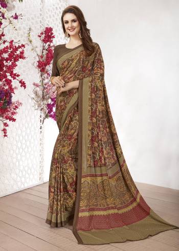 For Your Casuals Or Semi-Casuals, Grab This Light Weight Printed Saree Fabricated On Crepe. Its Fabric IS Soft Towards Skin And Ensures Superb Comfort All Day Long. Buy Now