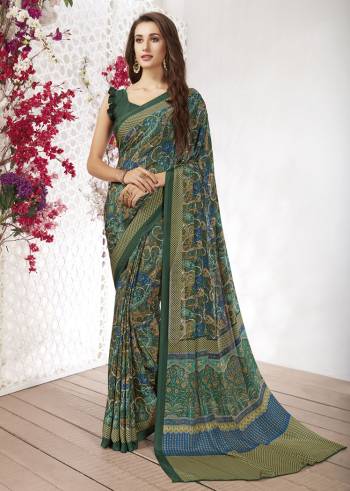 Add Some Casuals With This Pretty Saree Fabricated On Crepe. This Saree And Blouse are Beautified With prints And It Is Light Weight And Easy To Carry All Day Long