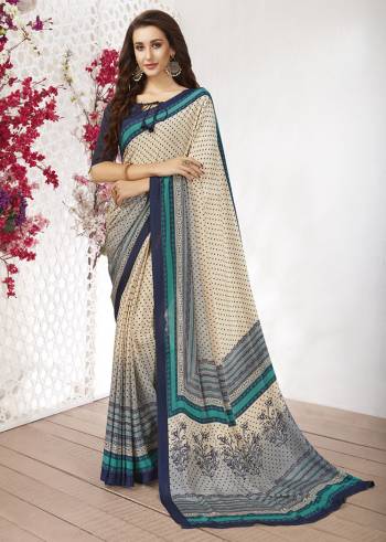 Add Some Casuals With This Pretty Saree Fabricated On Crepe. This Saree And Blouse are Beautified With prints And It Is Light Weight And Easy To Carry All Day Long