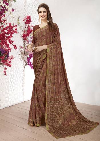 Add Some Casuals With This Pretty Saree Fabricated On Crepe. This Saree And Blouse are Beautified With prints And It Is Light Weight And Easy To Carry All Day Long