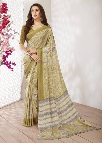 Add Some Casuals With This Pretty Saree Fabricated On Crepe. This Saree And Blouse are Beautified With prints And It Is Light Weight And Easy To Carry All Day Long