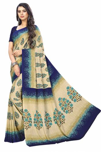 Add Some Casuals With This Pretty Saree Fabricated On Crepe. This Saree And Blouse are Beautified With prints And It Is Light Weight And Easy To Carry All Day Long