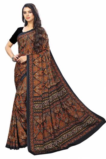 For Your Casuals Or Semi-Casuals, Grab This Light Weight Printed Saree Fabricated On Crepe. Its Fabric IS Soft Towards Skin And Ensures Superb Comfort All Day Long. Buy Now