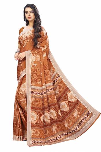 For Your Casuals Or Semi-Casuals, Grab This Light Weight Printed Saree Fabricated On Crepe. Its Fabric IS Soft Towards Skin And Ensures Superb Comfort All Day Long. Buy Now