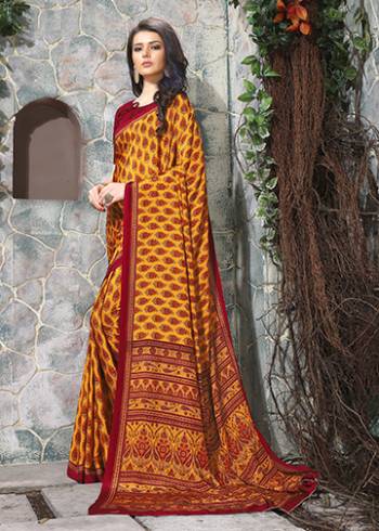 Add Some Casuals With This Pretty Saree Fabricated On Crepe. This Saree And Blouse are Beautified With prints And It Is Light Weight And Easy To Carry All Day Long