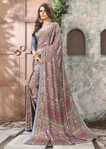 Add Some Casuals With This Pretty Saree Fabricated On Crepe. This Saree And Blouse are Beautified With prints And It Is Light Weight And Easy To Carry All Day Long