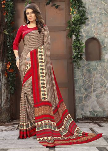 Add Some Casuals With This Pretty Saree Fabricated On Crepe. This Saree And Blouse are Beautified With prints And It Is Light Weight And Easy To Carry All Day Long