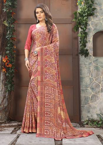 Add Some Casuals With This Pretty Saree Fabricated On Crepe. This Saree And Blouse are Beautified With prints And It Is Light Weight And Easy To Carry All Day Long