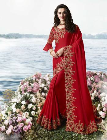 Adorn The Pretty Angelic Look In Bold And Beautiful Heavy Designer Saree In Red Color Paired With Red Colored Blouse. This Pretty Saree Is Silk Georgette Based Paired With Art Silk And Net Fabricated Blouse. 