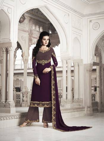 Here Is A Beautiful Heavy Designer Suit In All Over Wine Color. Its Heavy Embroidered Top And Dupatta Are Georgette Based Paired With Soft Silk Bottom. Its Fabrics Are Light Weight And Easy To Carry All Day Long. 