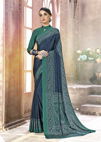 Add Some Casuals With This Pretty Saree Fabricated On Crepe. This?Saree And Blouse are Beautified With prints And It Is Light Weight And Easy To Carry All Day Long