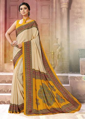 Add Some Casuals With This Pretty Saree Fabricated On Crepe. This?Saree And Blouse are Beautified With prints And It Is Light Weight And Easy To Carry All Day Long