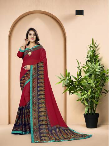 Shine Bright In This Lovely Dark Pink Colored Saree. This Saree And Blouse Are Fabricated on Georgette With Broad Border Prints. 