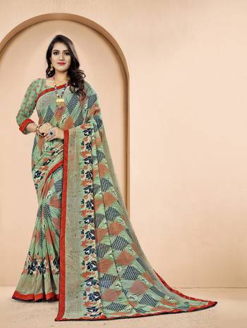 Add Some Casuals With This Pretty Saree In Multi Color. This Saree And Blouse Are Fabricated On Georgette Beautified With Prints All Over. 