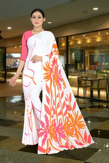 Add Some Casuals With This Pretty Saree Fabricated On Crepe. This Saree And Blouse are Beautified With prints And It Is Light Weight And Easy To Carry All Day Long