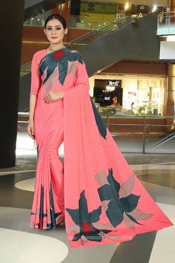 Add Some Casuals With This Pretty Saree Fabricated On Crepe. This Saree And Blouse are Beautified With prints And It Is Light Weight And Easy To Carry All Day Long
