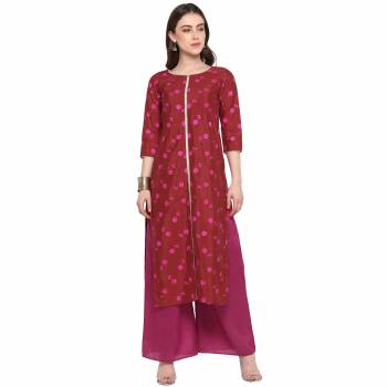 Grab This Readymade Pair In Red Colored Kurti Paired With Contrasting Magenta Pink Colored Bottom. This Pretty Pair Is Poly Silk Based Beautified With Floral Prints Over Kurti. 