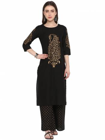 For A Bold And Beautiful Look, Grab This Readymade Kurti In Black Color Paired With Readymade Black Colored Bottom. This Pair Is Cotton Based Beautified With Foil Prints. 