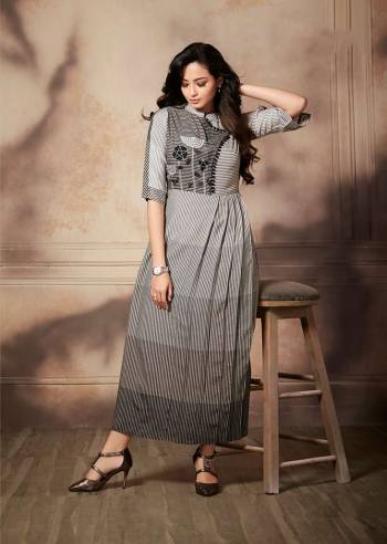 Rich And Elegant Looking Long Kurti Is Here In Black And White Color. This Readymade Kurti Is Handloom Rayon Based Which Is Light Weight And Easy To Carry All Day Long. 