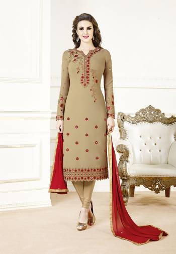 Get Ready For The Upcoming Festive And Wedding Season Wearing This Designer Straight Suit In Beige Color Paired With Contrasting Red Colored Dupatta. Its Top Is Georgette Based Paired With Santoon Bottom And Chiffon Fabricated Dupatta. Buy Now.?