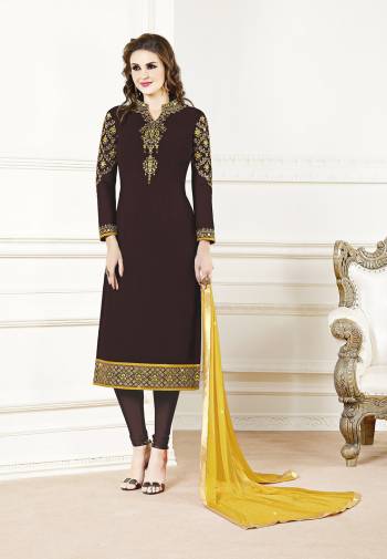 Add This Beautiful Designer Straight Suit To Your Wardrobe In Brown Color?Paired With Contrasting Yellow Colored Dupatta. Its Top Is Fabricated On Georgette Paired With Santoon Bottom And Chiffon Dupatta. Its Fabric Is Light In Weight And Easy To Carry All Day Long.