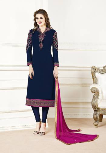 Add This Beautiful Designer Straight Suit To Your Wardrobe In Navy Blue Color?Paired With Rani Pink Colored Dupatta. Its Top Is Fabricated On Georgette Paired With Santoon Bottom And Chiffon Dupatta. Its Fabric Is Light In Weight And Easy To Carry All Day Long.