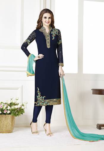 Celebrate This Festive Season With Beauty And Comfort Wearing This Designer Straight Suit In Navy Blue Color Paired With Contrasting Blue Colored Dupatta. Its Top Is Fabricated on Georgette Paired With Santoon Bottom And Chiffon Fabricated Dupatta. All Its Fabrics Are Light Weight And Ensures Superb Comfort All Day Long. 