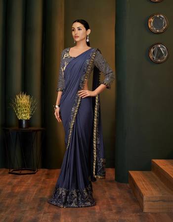 Trendy and contemporary , this pre-pleated saree is a must-have if you love to experiment with your fashion choices. Adorn it with classic diamond jewels for a sophisticated appeal. 