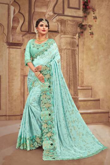 You Will Definitely Earn Lots Of Compliments Wearing This Heavy Designer Which Is Perfectly Suitable For Wedding Wear. This Pretty Saree Is Satin Georgette Based Which Is Durable And Eary To Carry.