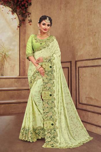 Get Ready For The Upcoming Wedding Season With This Heavy Designer Saree With Heavy Embroidery Fabricated On Satin Georgette. Its Attractive Embroidery And Pretty Color Will Definitely Earn You Lots Of Compliments From Onlookers. 