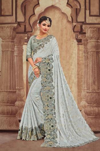 You Will Definitely Earn Lots Of Compliments Wearing This Heavy Designer Which Is Perfectly Suitable For Wedding Wear. This Pretty Saree Is Satin Georgette Based Which Is Durable And Eary To Carry.