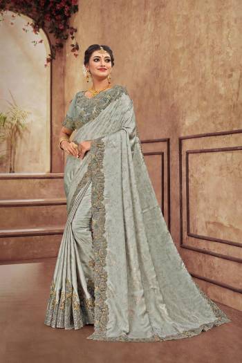 You Will Definitely Earn Lots Of Compliments Wearing This Heavy Designer Which Is Perfectly Suitable For Wedding Wear. This Pretty Saree Is Satin Georgette Based Which Is Durable And Eary To Carry.