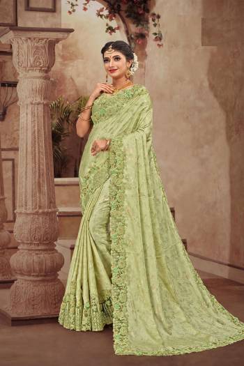 Get Ready For The Upcoming Wedding Season With This Heavy Designer Saree With Heavy Embroidery Fabricated On Satin Georgette. Its Attractive Embroidery And Pretty Color Will Definitely Earn You Lots Of Compliments From Onlookers. 