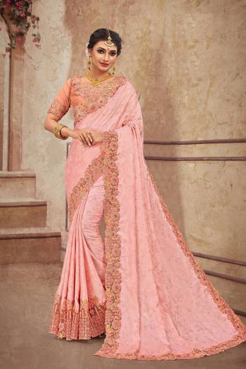 You Will Definitely Earn Lots Of Compliments Wearing This Heavy Designer Which Is Perfectly Suitable For Wedding Wear. This Pretty Saree Is Satin Georgette Based Which Is Durable And Eary To Carry.