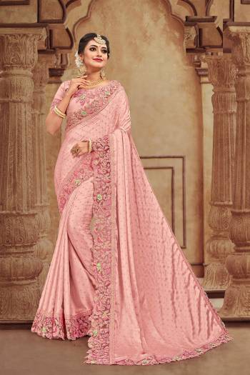 You Will Definitely Earn Lots Of Compliments Wearing This Heavy Designer Which Is Perfectly Suitable For Wedding Wear. This Pretty Saree Is Satin Georgette Based Which Is Durable And Eary To Carry.