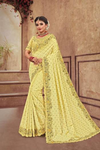 Get Ready For The Upcoming Wedding Season With This Heavy Designer Saree With Heavy Embroidery Fabricated On Satin Silk. Its Attractive Embroidery And Pretty Color Will Definitely Earn You Lots Of Compliments From Onlookers. 