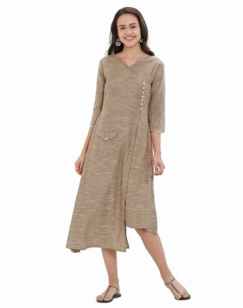 New And Unique Patterned Designer Readymade Kurti Is Here In Beige Color Fabricated On South Cotton. It Is Light Weight And Easy To Carry All Day Long. 