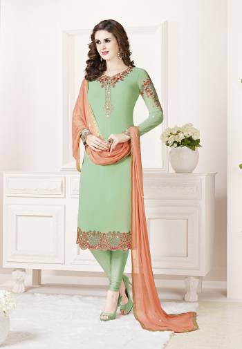 Celebrate This Festive Season With Beauty And Comfort Wearing This Designer Straight Suit In Light Green Color Paired With Peach Colored Dupatta. Its Top Is Fabricated on Georgette Paired With Santoon Bottom And Chiffon Fabricated Dupatta. All Its Fabrics Are Light Weight And Ensures Superb Comfort All Day Long.