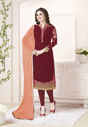 Add This Beautiful Designer Straight Suit To Your Wardrobe In Maroon Color Paired With Peach Colored Dupatta. Its Top Is Fabricated On Georgette Paired With Santoon Bottom And Chiffon Dupatta. Its Fabric Is Light In Weight And Easy To Carry All Day Long