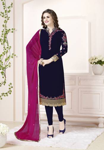 Add This Beautiful Designer Straight Suit To Your Wardrobe In Navy Blue Color Paired With Dark Pink Colored Dupatta. Its Top Is Fabricated On Georgette Paired With Santoon Bottom And Chiffon Dupatta. Its Fabric Is Light In Weight And Easy To Carry All Day Long