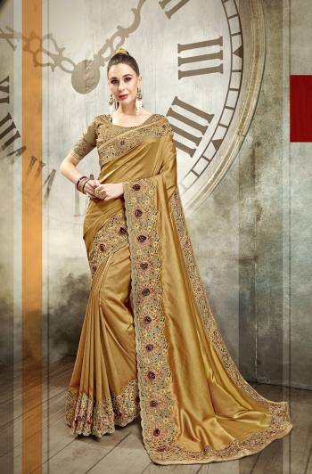 Celebrate This Festive Season With This Very Beautiful And Attractive Looking Heavy Designer Saree In Golden Color. This Heavy Embroidered Saree And Blouse Are Silk Based Which Also Gives A Rich Look To Your Personality. 