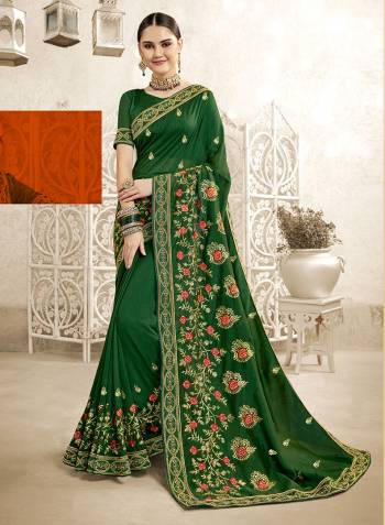 Look Attractive In This Beautiful Designer Saree In Dark Green Color. This Saree And Blouse Are Silk Based Beautified With Pretty Embroidery Work. Buy Now.