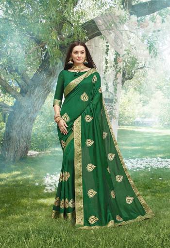 This Festive Season, Look The Most Elegant And Confident Of all Wearing This Designer Jari Embroidered Saree In Green Highlighted With Stone Work, Also It Is Silk Based Which Gives A Rich Look To Your Personality. 