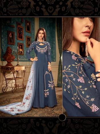 Celebrate This Festive Season Wearing This Readymade Gown In Navy Blue Color Paired With Contrasting Grey Color Dupatta. This Pretty Embroidered Gown And Digital Printed Dupatta Are Muslin Based Which IS Soft Towards Skin And Easy To Carry All Day Long. 