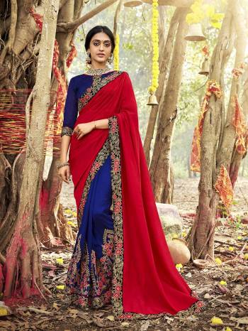 Shine Bright In This Lovely Designer Saree In Red And Royal Blue Color Paired With Royal Blue Colored Blouse. This Saree Is Fabricated On Vichitra Silk Paired With Art Silk Fabricated Blouse. Buy This Saree Now.