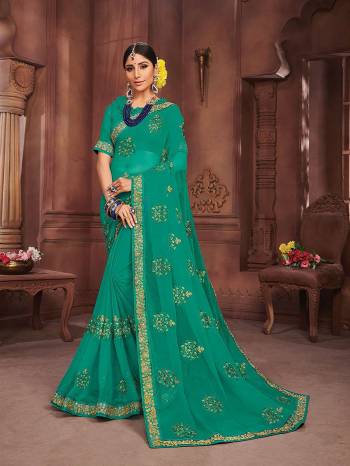 Here Is Pretty Simple And Elegant Looking Designer Saree In Sea Green Color. This Pretty Embroidered Saree Is Chiffon Based Which Is Light In Weight And Easy To Carry Throughout The Gala.