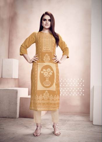 Grab this Amazing Comfy Kurti In Occur Yellow Color Fabricated On Rayon. It Is Beautified With Prints And Can Be Paired With Leggings, Pants Or Plazzo. Grab This Lovely Summer Perfect Kurti. 